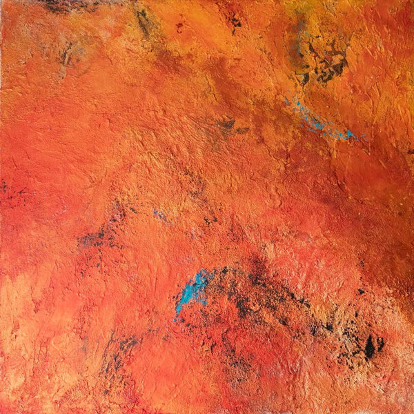 Satellite view of sand patterns with orange and red hues