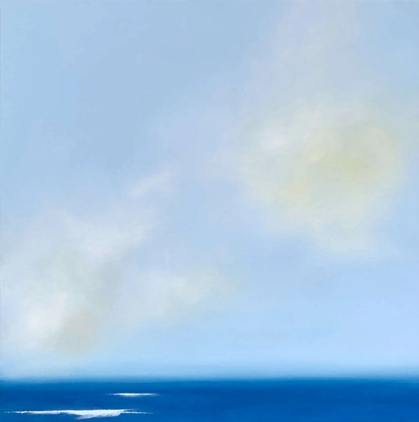 Seascape with gradient sky with blue and yellow hues