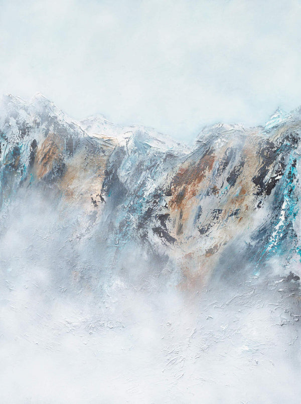 Snowy mountain landscape with mist and light blue sky