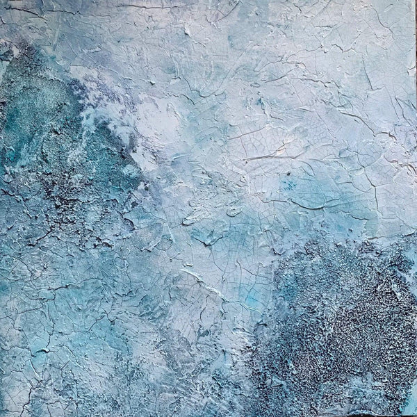 Abstract art with blue tones on a textured background